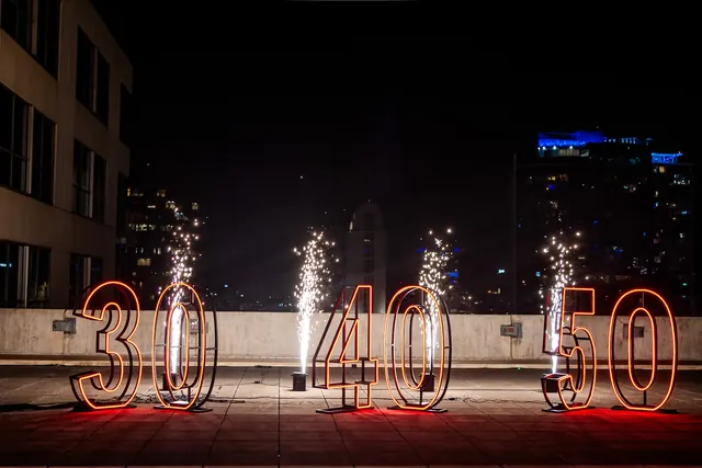 Illuminated rooftop decorations and spark fountains at the 2026 Goodness Gala