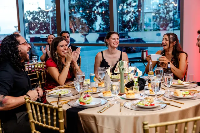 Guests seated together at a gala table at the 2026 Goodness Gala