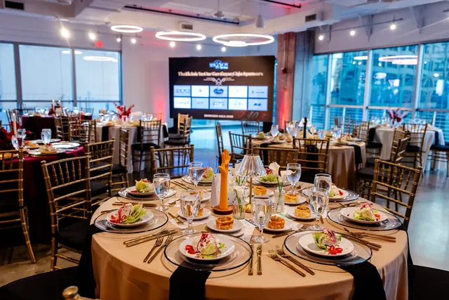 Gala dining room at dusk at the 2026 Goodness Gala